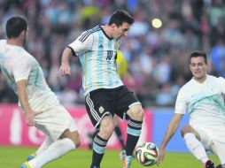 Lionel Messi salió del banquillo de suplentes para redondear la despedida de la Albiceleste de tierras argentinas. AFP /