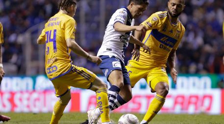 En un partido no tan vistoso, el duelo de ida entre Puebla y Tigres dejó un marcador igualado de 2-2. IMAGO7